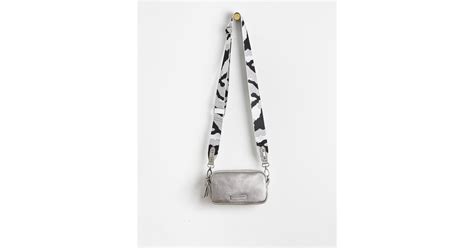 oliver bonas silver crossbody strap.